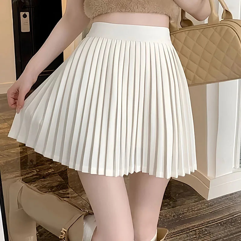 Sweet Elastic Spliced Solid Color Pleated Skirts Female Clothing 2025 Summer New Loose Preppy Style High Waist Mini Skirts